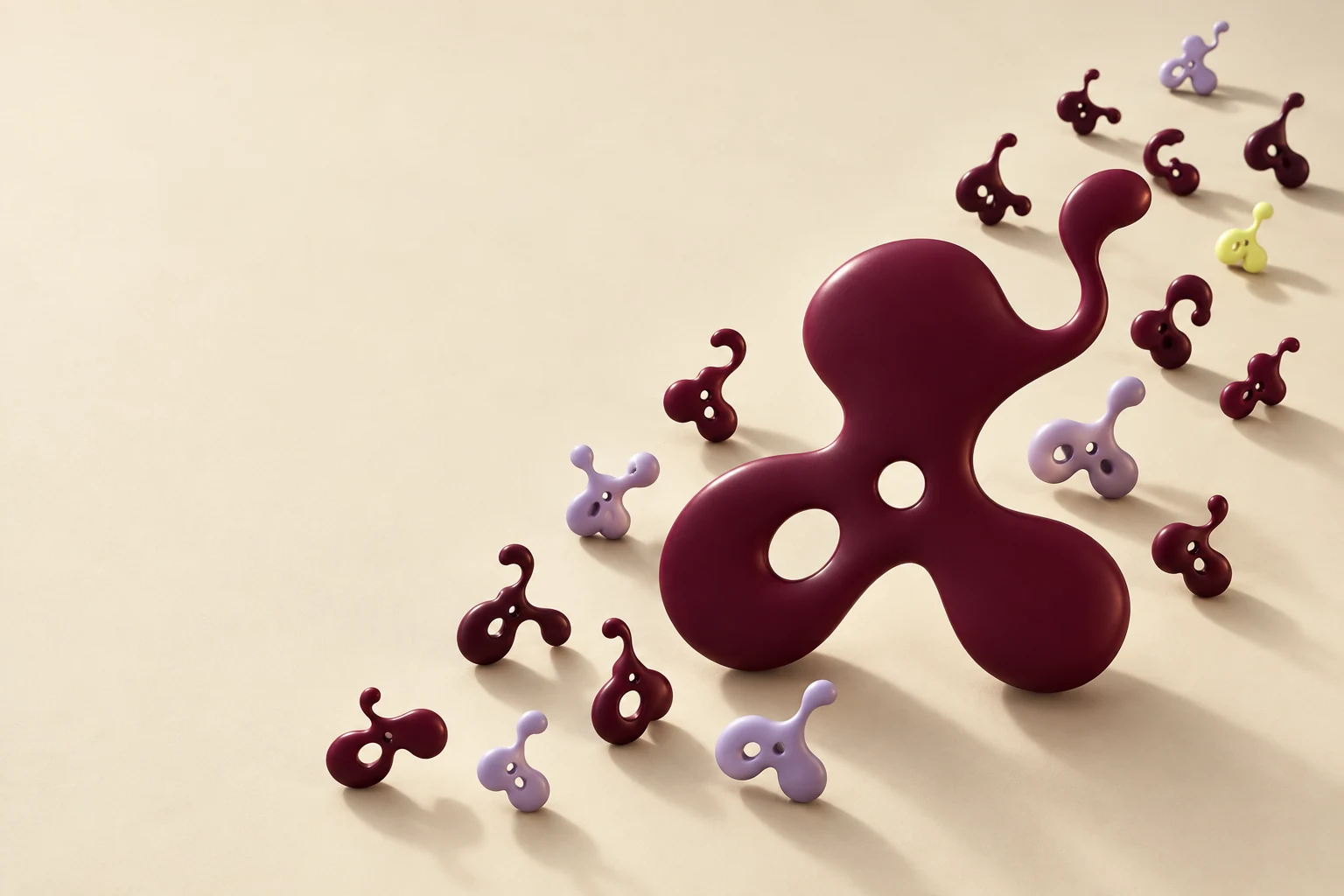 A family of burgundy, lavender, and butter-yellow Aftermyth shapes on a warm cream surface